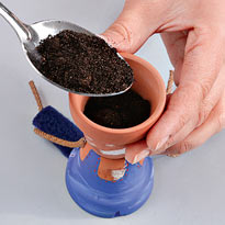 Заполнением грунтом