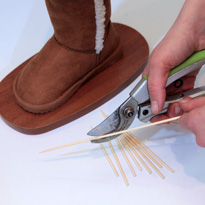 Новогоднее дерево в валенке из мандаринов