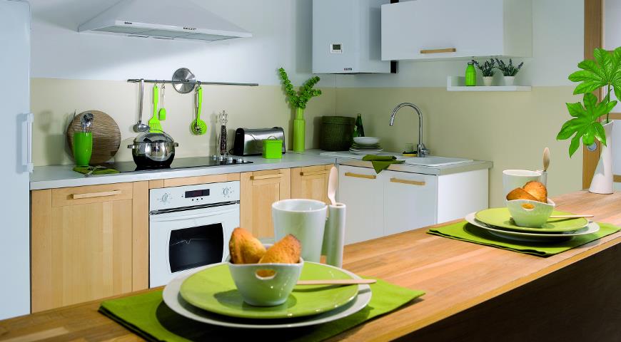 Кухня в зеленом цвете с отопительным котлом